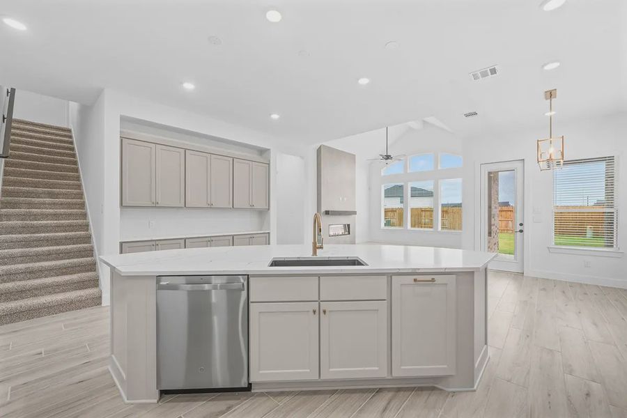 Representative furnished interior of a home built from the Madison by Chesmar Homes in Grange, Katy (Image 6).