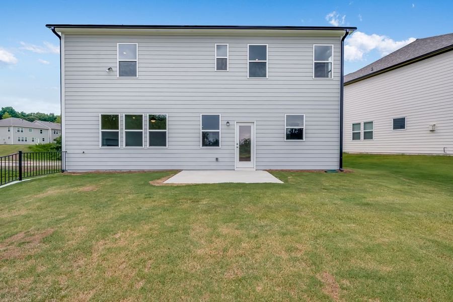 Representative exterior photo of a completed home built from the Kirkwood by Taylor Morrison in Stratford Hills, Ball Ground, GA (Image 19).