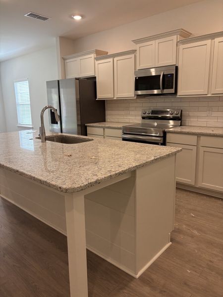 Furnished interior view inside a new home in Woodruff Cove, Murfreesboro (Image 5).