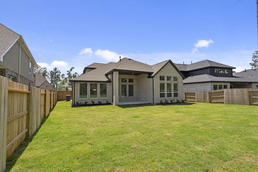 Exterior details and patio area of a home in Evergreen, Conroe (Image 3).