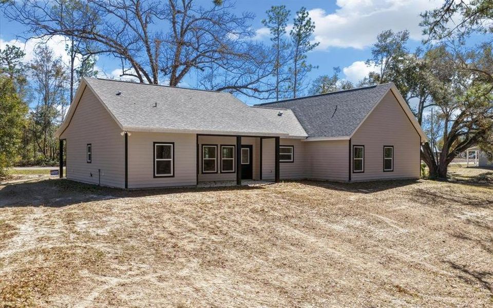 Exterior details and patio area of a home in , Lake City (Image 34).
