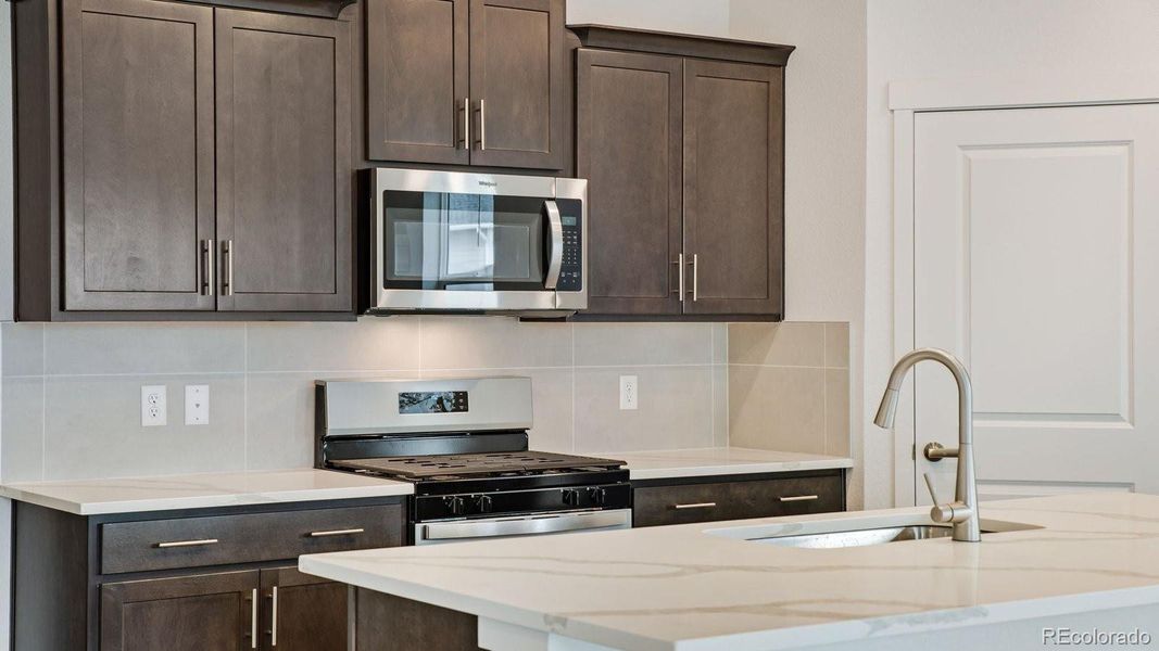 Furnished interior view inside a new home in Trails at Crowfoot, Parker (Image 11).