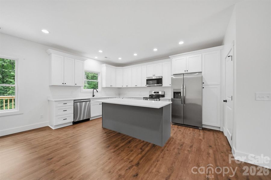 Furnished interior view inside a new home in , Lenoir (Image 10).