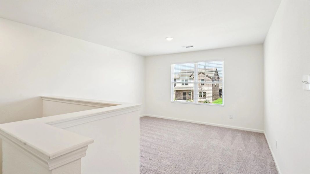 Representative unfurnished interior of a home built from the Jupiter by Starlight Homes in Brookshire at Legacy Hills, Celina (Image 15).