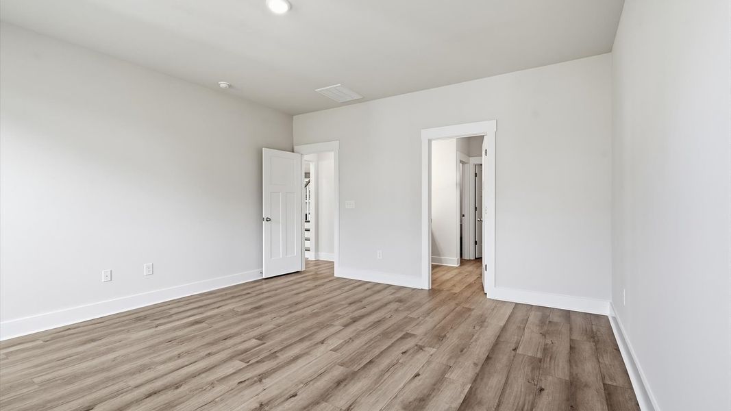 Accomplished design meets restful elegance in this exclusive primary suite by DRB Homes