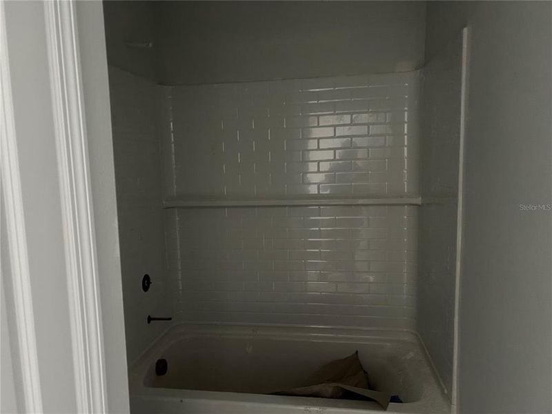 In-progress construction of a new home in Oakfield Trails Signature, Parrish, FL (Image 19).