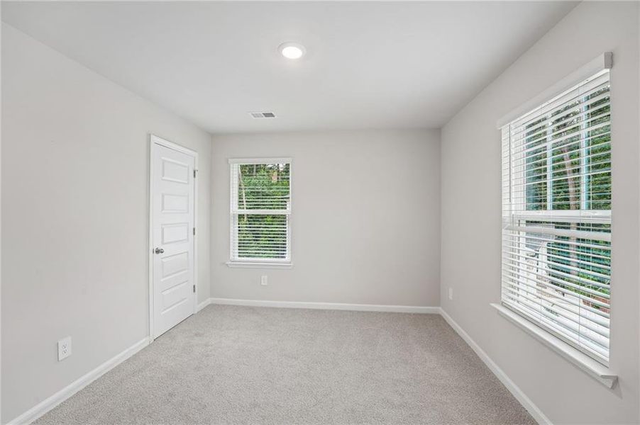 Spacious, unfurnished interior of a new home in Hemingway - Reserve Series, Cumming (Image 44). Spacious, unfurnished interior of a new home in Hemingway - Reserve Series, Cumming (Image 44).