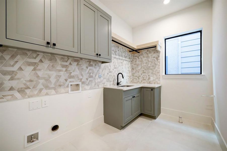 Elevate your home experience with a versatile utility room, complete with a stylish, optional pet washing station.