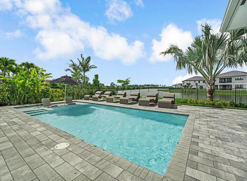 Exterior details and patio area of a home in Apex at Avenir, Palm Beach Gardens (Image 36).