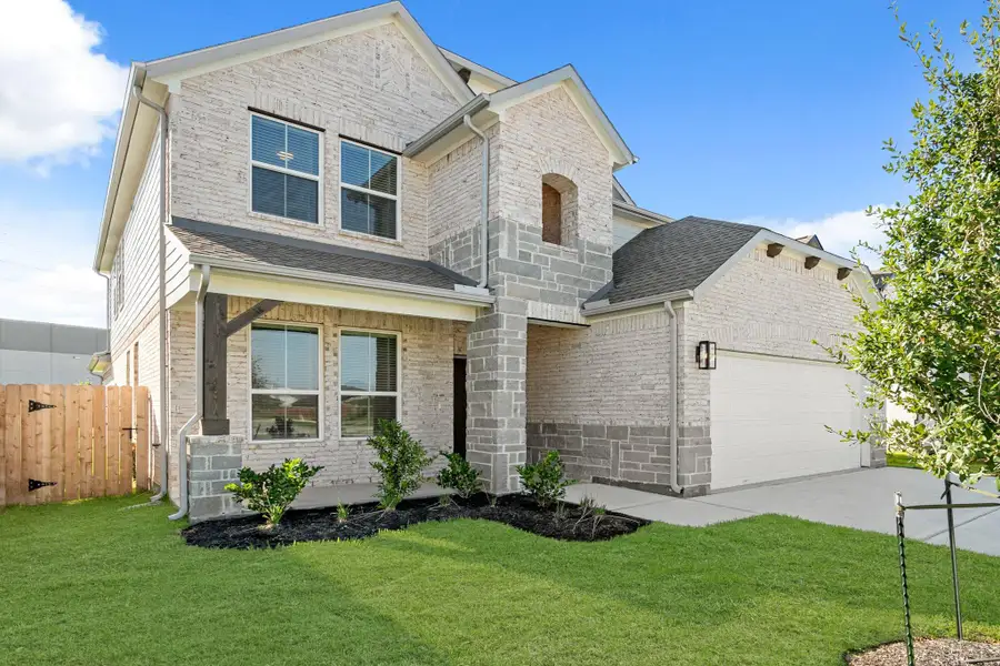 Front exterior of a new home in Morton Creek Ranch, Katy, TX, highlighting curb appeal (Image 1). Front exterior of a new home in Morton Creek Ranch, Katy, TX, highlighting curb appeal (Image 1).