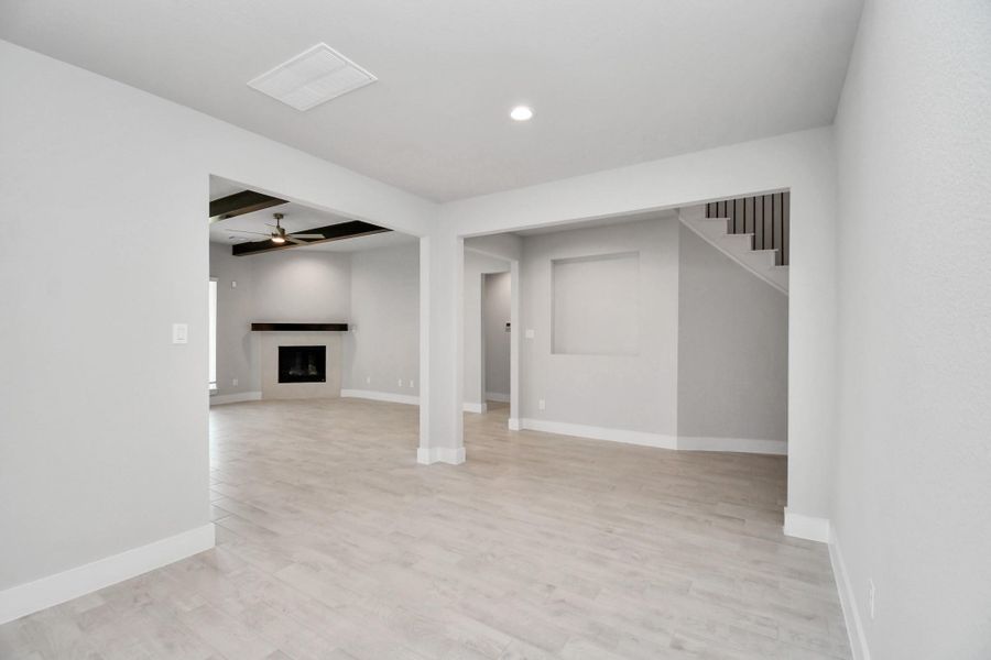 Make memories gathered around the table with your family and friends! This spacious dining room features elegant flooring, custom paint, and adjacent to family room and kitchen for open concept feel. Sample photo of completed home with similar floor plan. Actual colors and selections may vary. Make memories gathered around the table with your family and friends! This spacious dining room features elegant flooring, custom paint, and adjacent to family room and kitchen for open concept feel. Sample photo of completed home with similar floor plan. Actual colors and selections may vary.