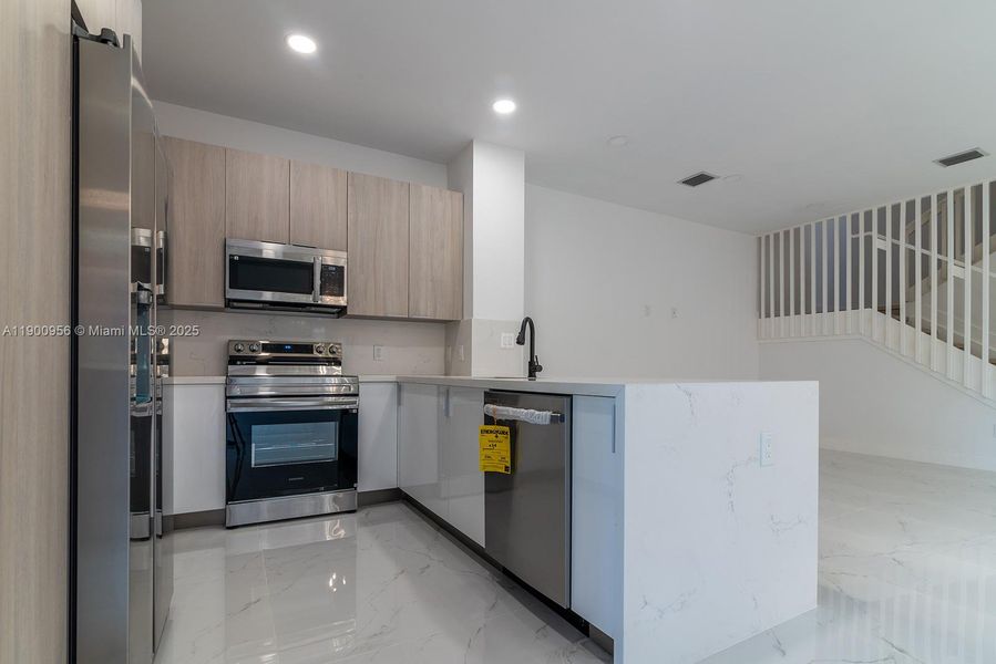 Furnished interior view inside a new home in , Miami (Image 11). Furnished interior view inside a new home in , Miami (Image 11).