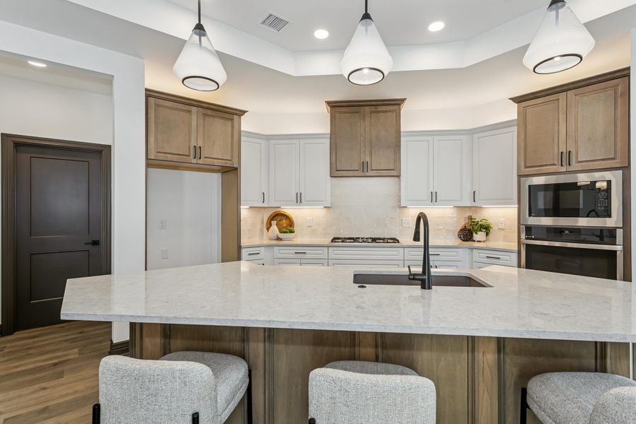 Furnished interior view inside a new home in The Courtyards at Jacobs Farm, Wichita (Image 7).