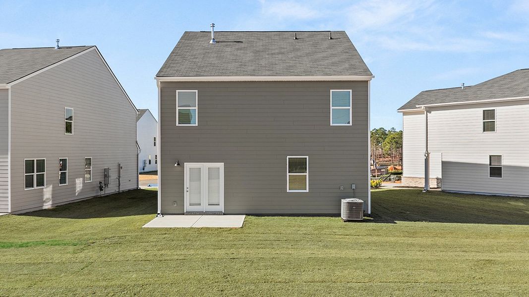 Exterior details and patio area of a home in The Abbey at Trolley Run Station, Aiken (Image 2).