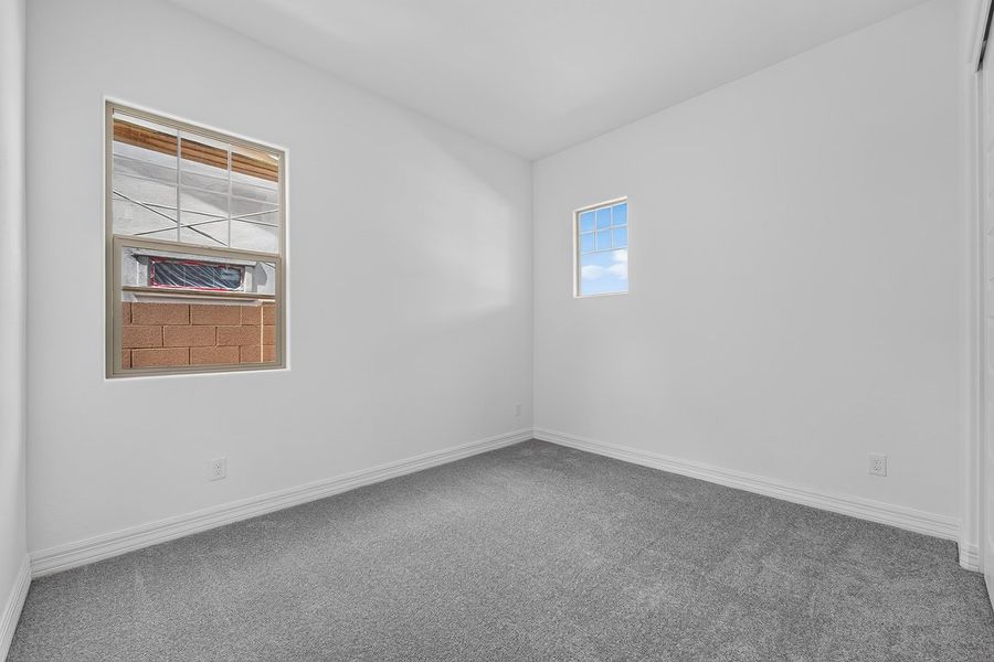 Spacious, unfurnished interior of a new home in Ellsworth Ranch, Queen Creek (Image 29).