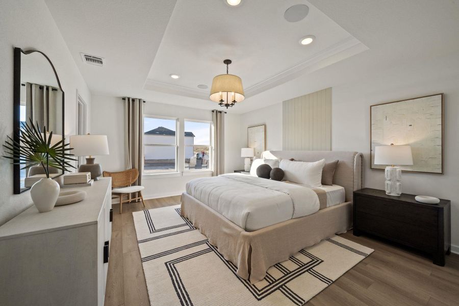 Photo of Pulte model home with same floor plan, not of actual home listed.