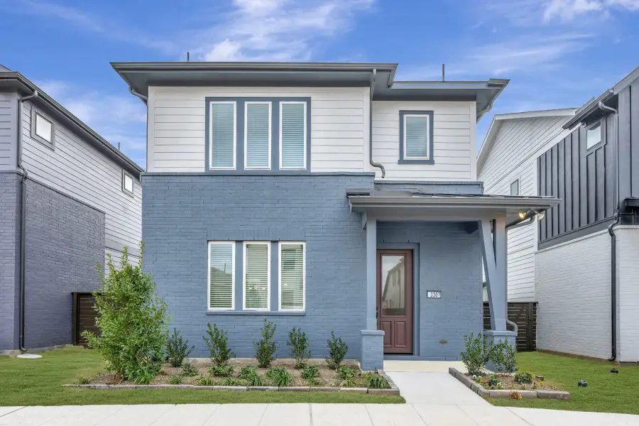 Front exterior of a new home in Indigo 35’ Homesites, Richmond, TX, highlighting curb appeal (Image 1). Front exterior of a new home in Indigo 35’ Homesites, Richmond, TX, highlighting curb appeal (Image 1).