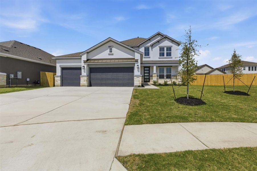 Front exterior of a new home in , Pflugerville, TX, highlighting curb appeal (Image 22).