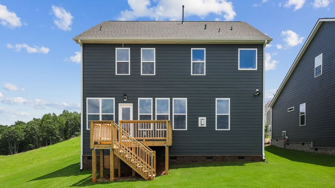 Exterior details and patio area of a home in Sunset Summits, Spartanburg (Image 19).