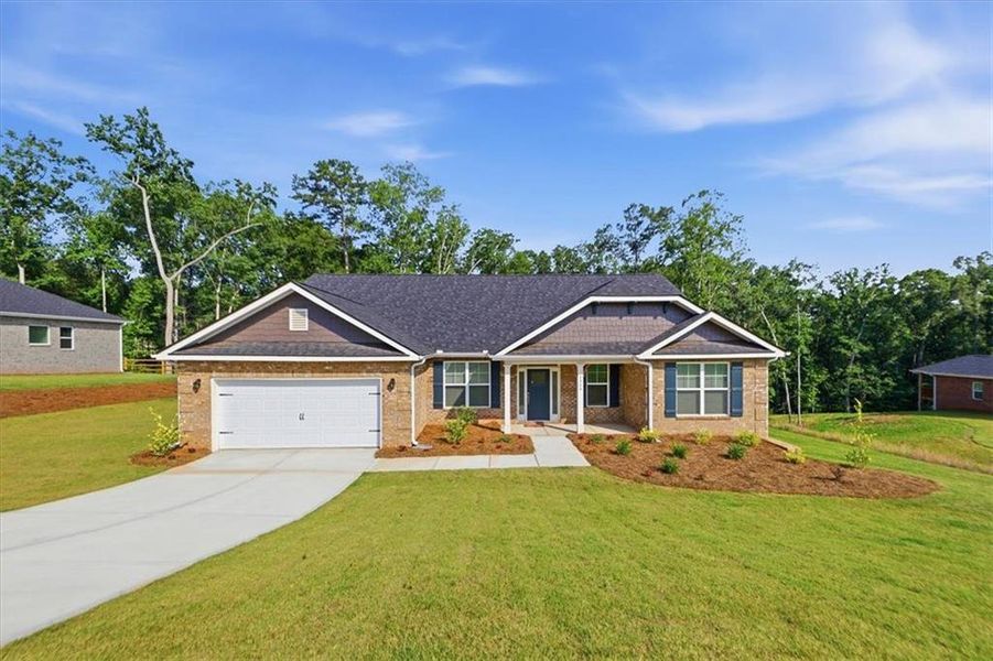 Front exterior of a new home in Tuscany Hills, Douglasville, GA, highlighting curb appeal (Image 2). Front exterior of a new home in Tuscany Hills, Douglasville, GA, highlighting curb appeal (Image 2).
