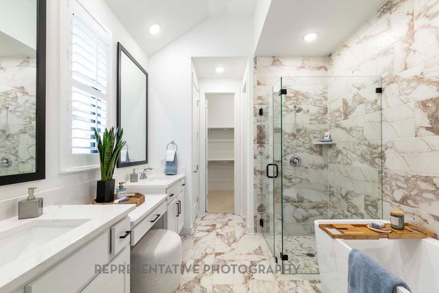 Bathroom with marble look tiles, a stall shower, two vanities, recessed lighting, and a tub to relax in Bathroom with marble look tiles, a stall shower, two vanities, recessed lighting, and a tub to relax in