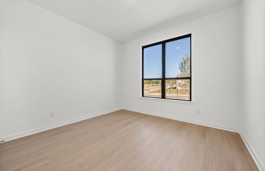 Spacious, unfurnished interior of a new home in 6 Creeks, Kyle (Image 53).
