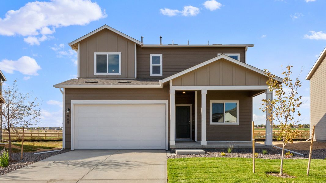 Front exterior of a new home in Granary, Johnstown, CO, highlighting curb appeal (Image 2). Front exterior of a new home in Granary, Johnstown, CO, highlighting curb appeal (Image 2).