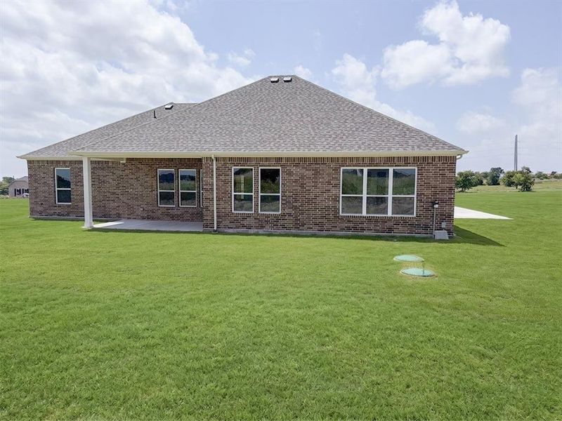 Exterior details and patio area of a home in Windmill Creeks, Weatherford (Image 3). Exterior details and patio area of a home in Windmill Creeks, Weatherford (Image 3).