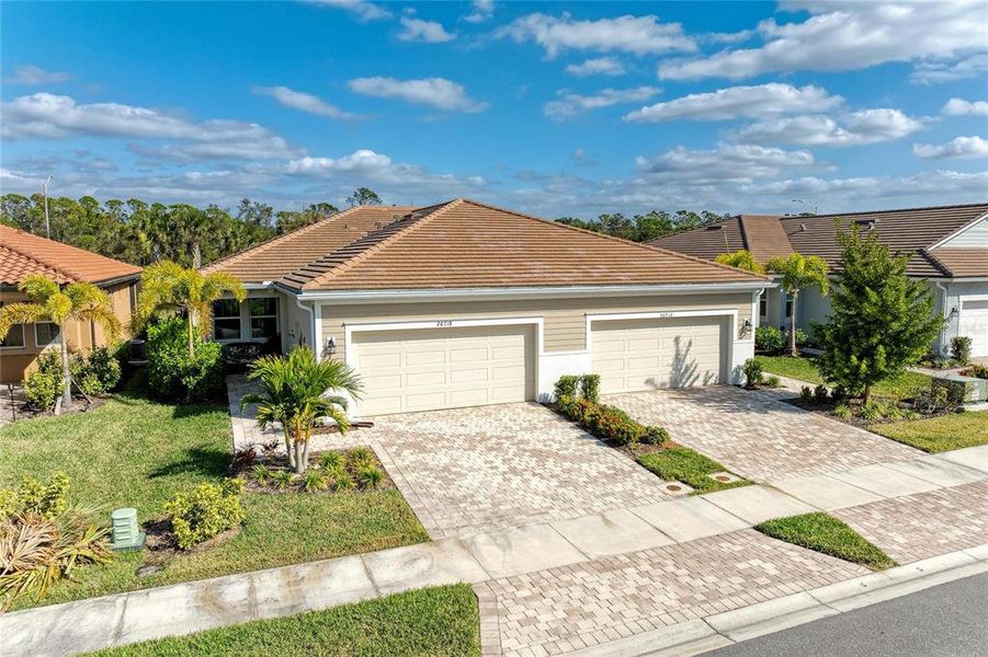 Front exterior of a new home in , Venice, FL, highlighting curb appeal (Image 1). Front exterior of a new home in , Venice, FL, highlighting curb appeal (Image 1).