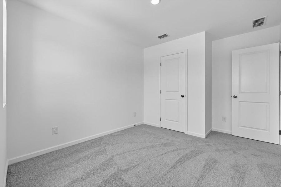 Spacious, unfurnished interior of a new home in Weatherfield, Buford (Image 33).