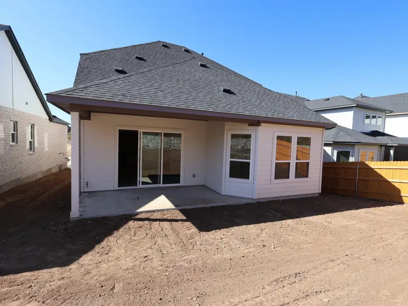 Exterior details and patio area of a home in Cedar Brook, Leander (Image 2). Exterior details and patio area of a home in Cedar Brook, Leander (Image 2).
