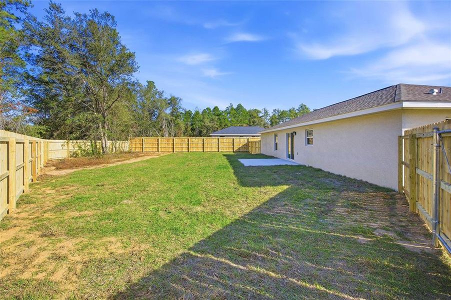Exterior details and patio area of a home in , Citrus Springs (Image 3).