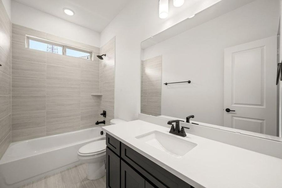 Furnished interior view inside a new home in High Country, Burleson (Image 13).