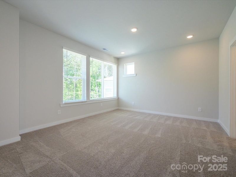 Spacious, unfurnished interior of a new home in Central Living at Craig, Charlotte (Image 12).