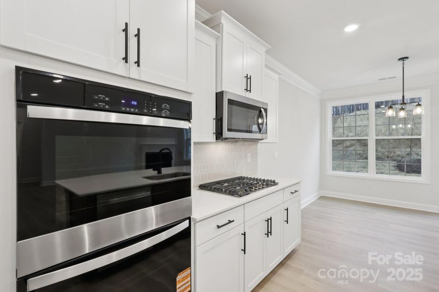 Furnished interior view inside a new home in Falls Cove, Troutman (Image 9).