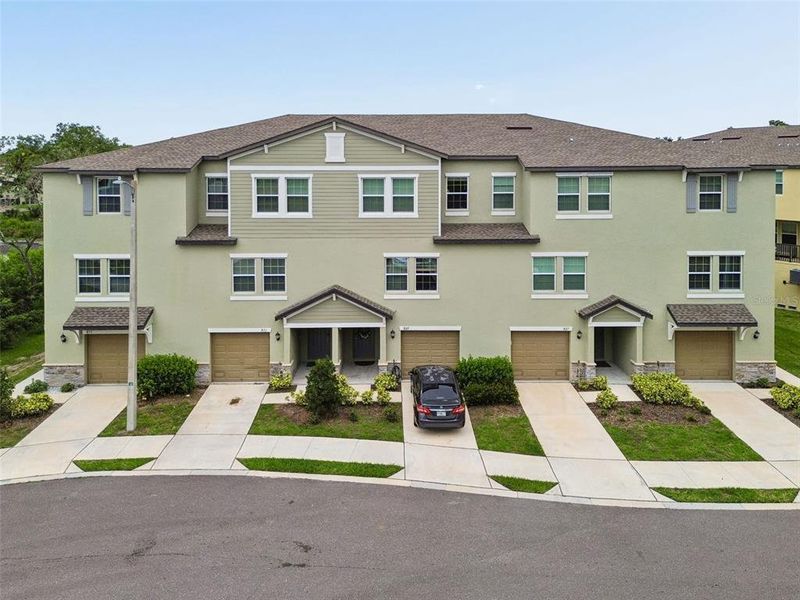 Front exterior of a new home in , Tampa, FL, highlighting curb appeal (Image 24). Front exterior of a new home in , Tampa, FL, highlighting curb appeal (Image 24).