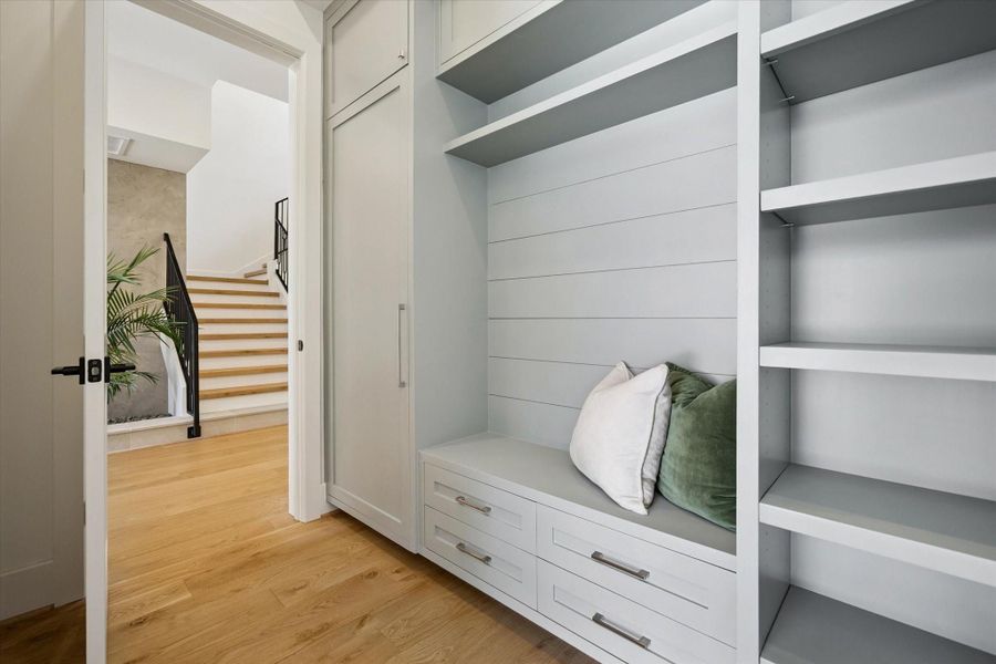 Mudroom with cubbies, and benche with storage to organize coats, shoes, and bags. Cabinets and shelves can help maximize space. Mudroom with cubbies, and benche with storage to organize coats, shoes, and bags. Cabinets and shelves can help maximize space.