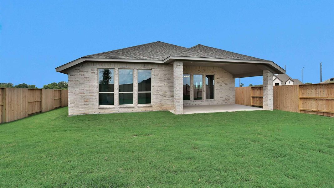 Exterior details and patio area of a home in Meridiana, Manvel (Image 3). Exterior details and patio area of a home in Meridiana, Manvel (Image 3).