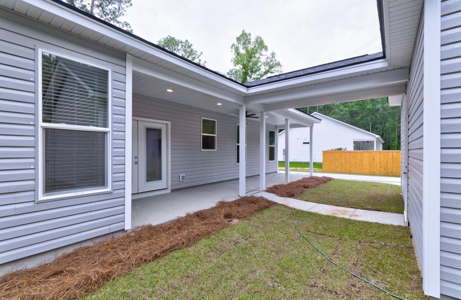 Front exterior of a new home in , Lincolnville, SC, highlighting curb appeal (Image 1). Front exterior of a new home in , Lincolnville, SC, highlighting curb appeal (Image 1).