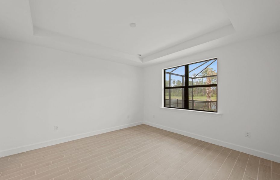 Representative unfurnished interior of a home built from the Concord by DiVosta in Talon Preserve on Palmer Ranch, Nokomis (Image 17).
