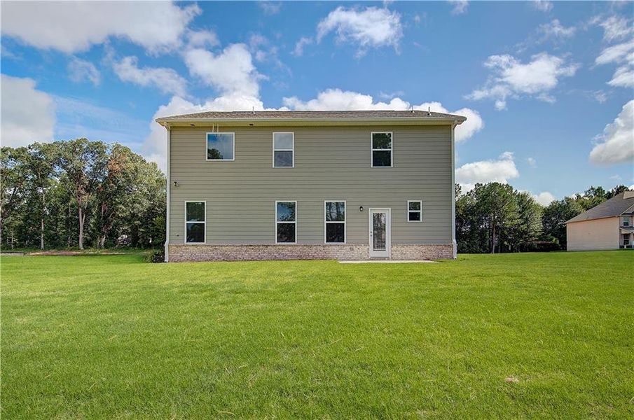 Front exterior of a new home in Westminster, Covington, GA, highlighting curb appeal (Image 15).