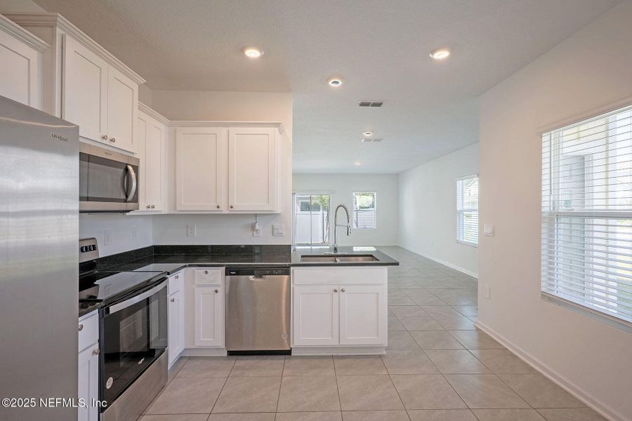 Furnished interior view inside a new home in , Jacksonville (Image 5). Furnished interior view inside a new home in , Jacksonville (Image 5).