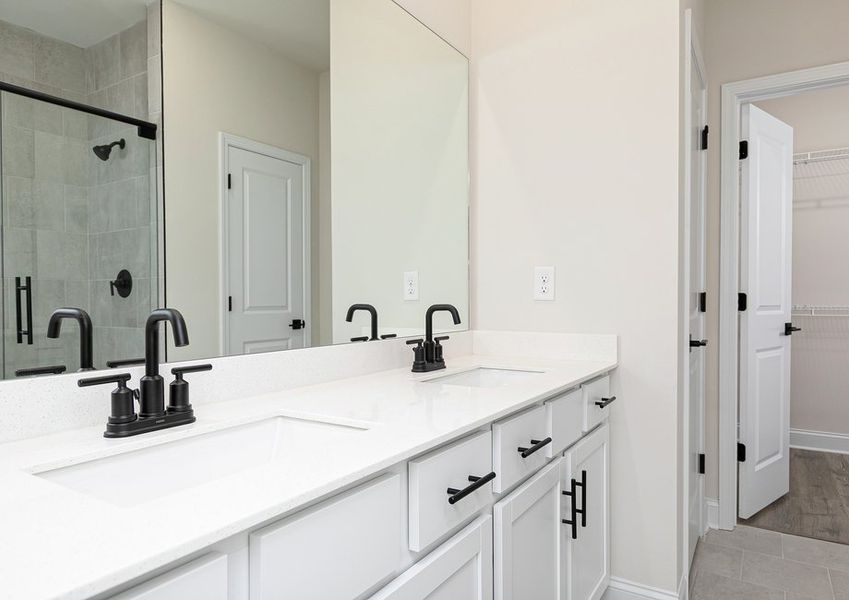 Get ready for your day in the master bathroom