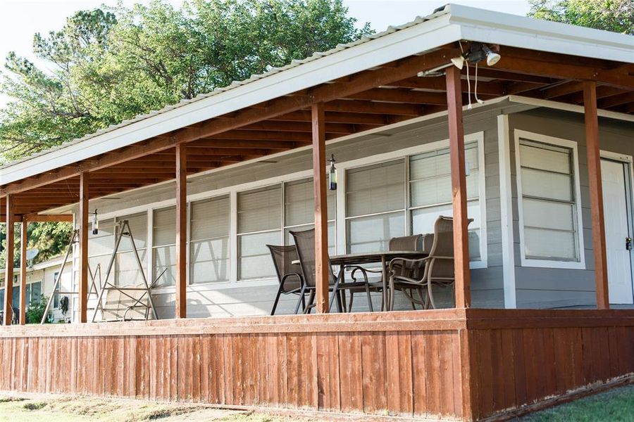 Exterior details and patio area of a home in , Graford (Image 15).