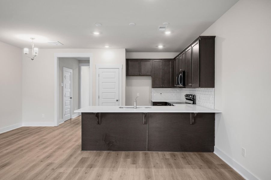 Photo is of a similar home