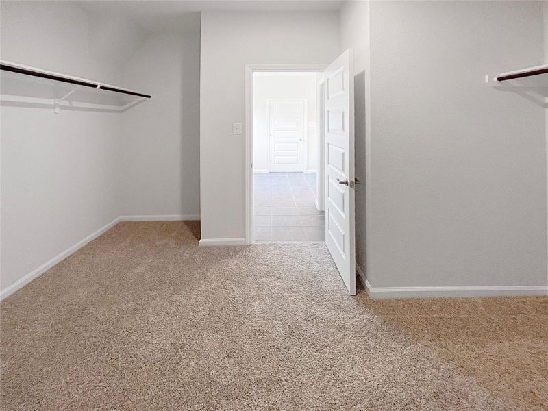 The McGinnis- Primary Suite Walk-in Closet. The McGinnis- Primary Suite Walk-in Closet.