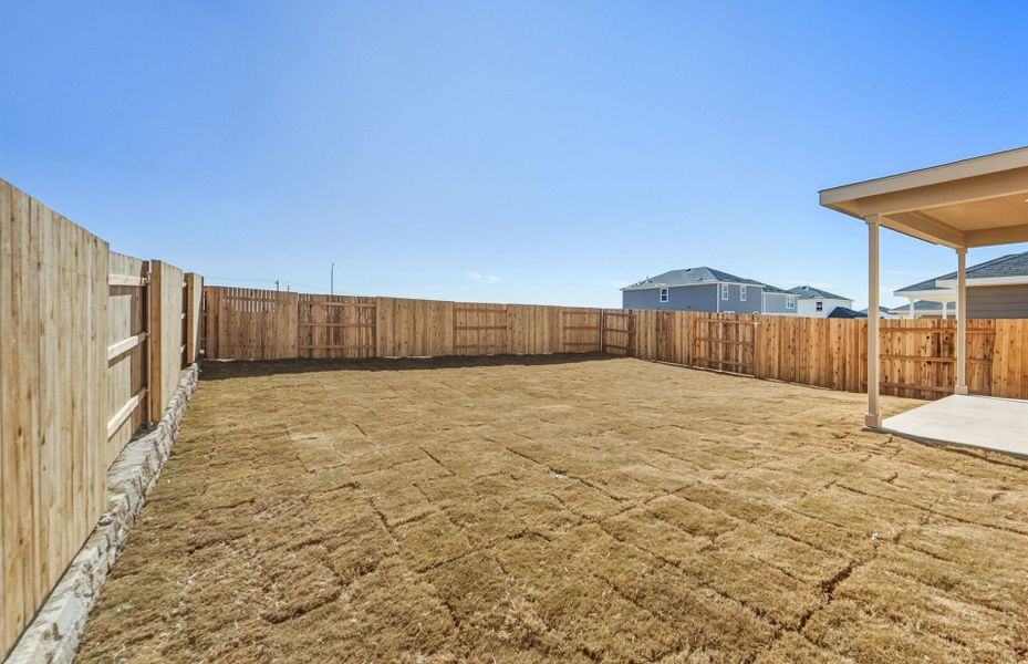 Exterior details and patio area of a home in Sunfield, Buda (Image 23).