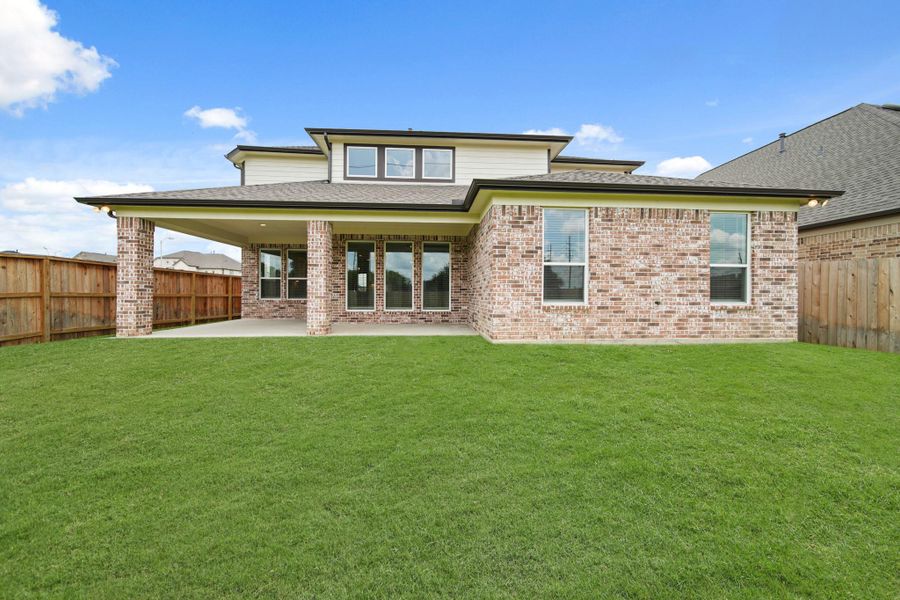 Front exterior of a new home in Morton Creek Ranch, Katy, TX, highlighting curb appeal (Image 2).