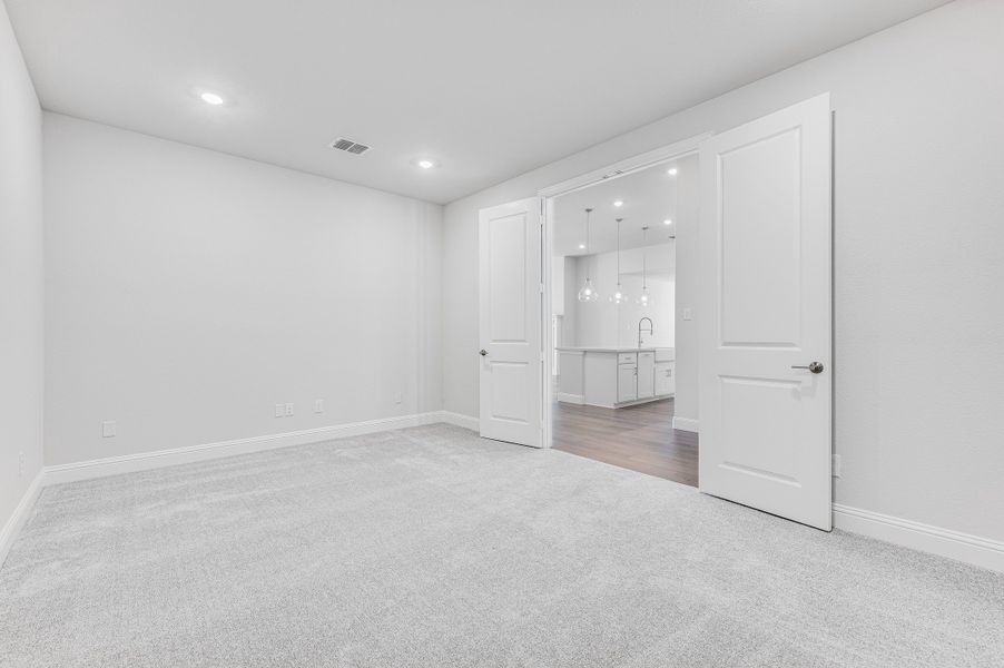 Representative unfurnished interior of a home built from the Jade by Taylor Morrison in South Oak 60s, Oak Point (Image 14).