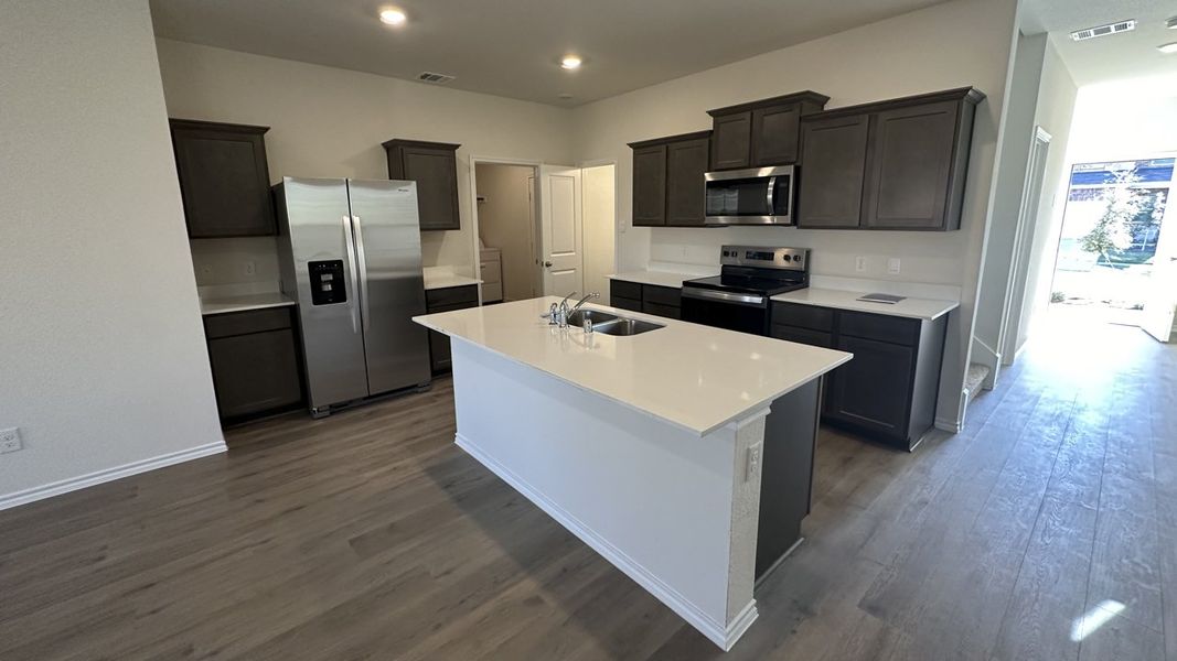 Representative furnished interior of a home built from the HANNA by D.R. Horton in Northspur, Forney (Image 6).